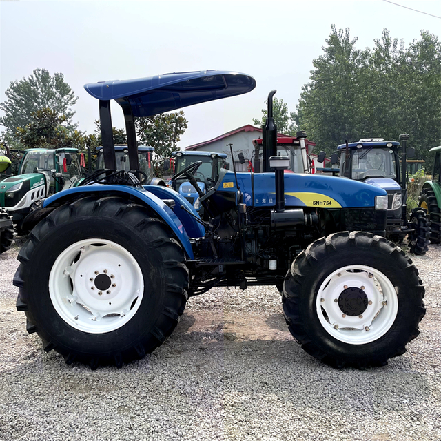 مستعملة جرار New Holland SNH754 New Holding 4WD مع أشعة الشمس والمعدات الزراعية